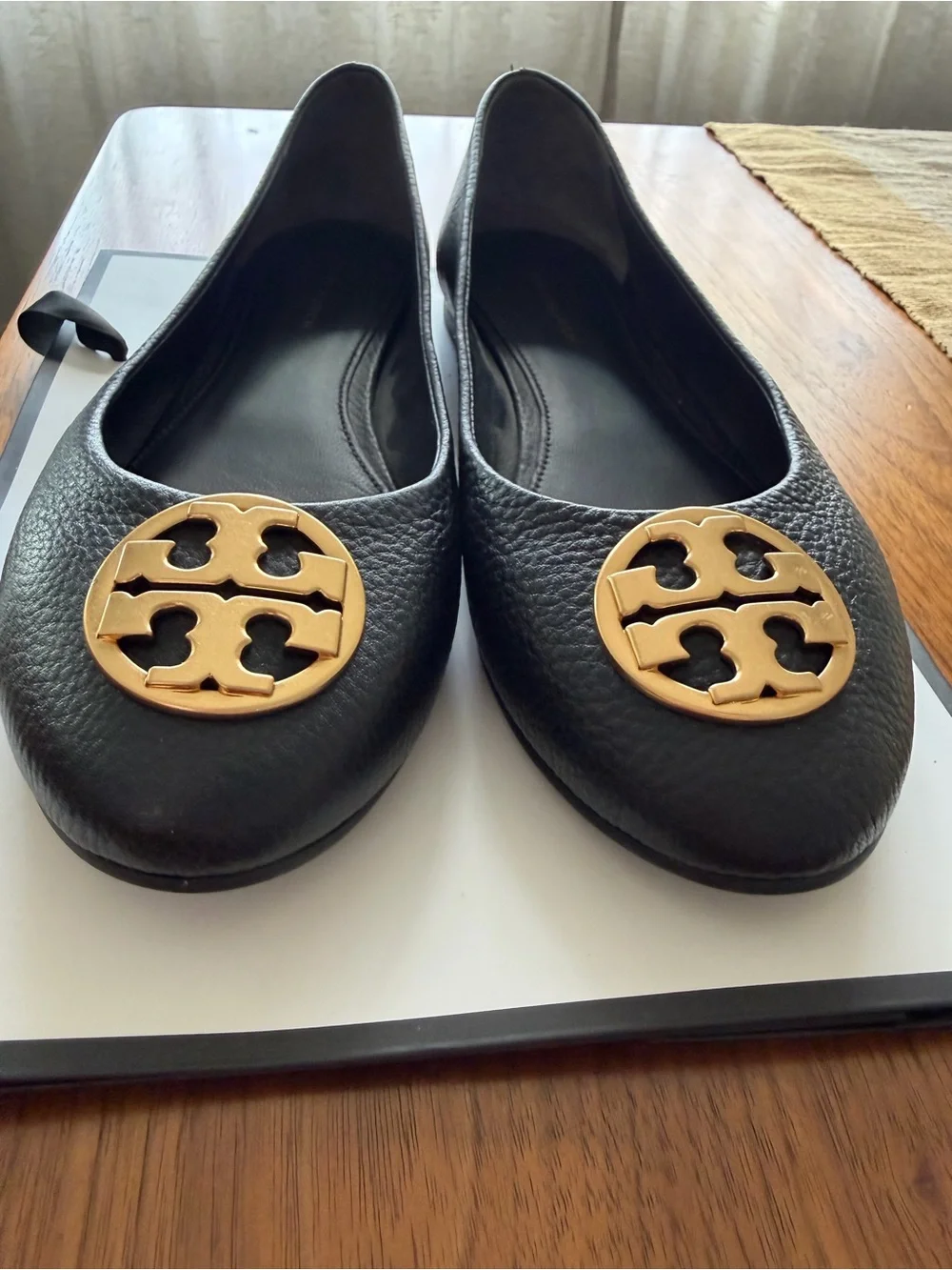 Tory Burch Black Pebbled Leather Logo Ballet Flats with Gold Medallions